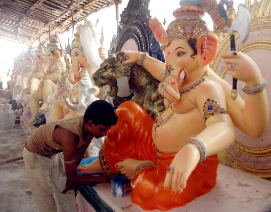 Final touch by Artist to Ganesh Idol